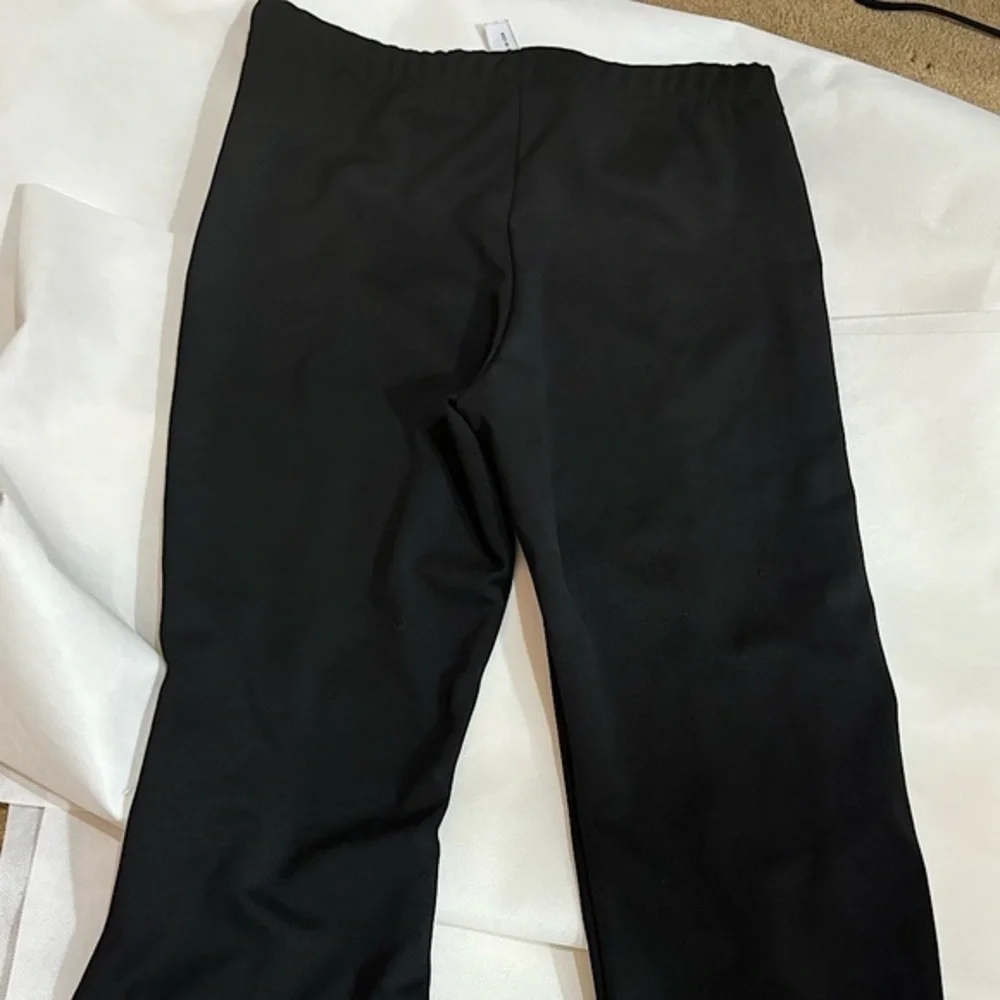 Black flare work pants with elastic waistband